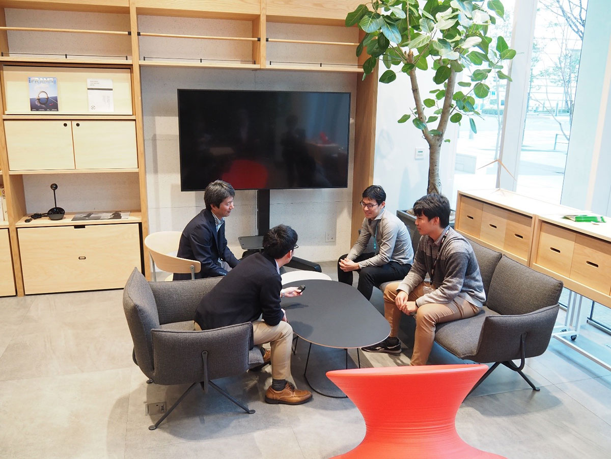 Mr. Maekawa and his team at the “Creative Fab” space in Kyocera’s new Research Center in Yokohama, discussing the development of the AI Recognition Camera