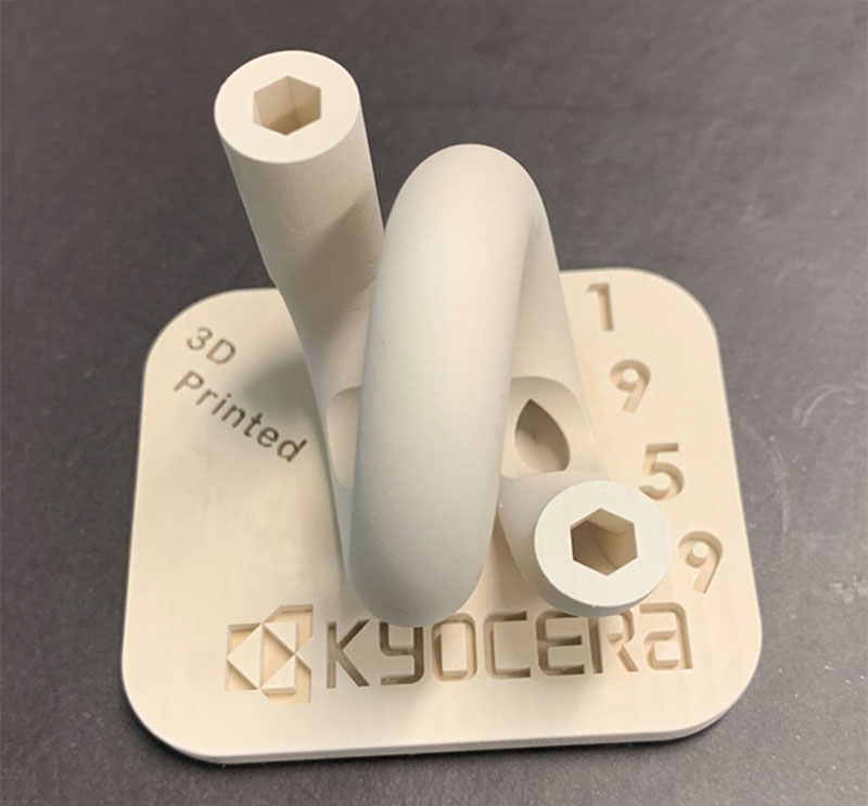 Sample Image Alt Text: Ceramic Additive Manufacturing Zirconia and Alumina Samples 3D Printing Ceramics Complex Geometries Tube Cylinder Feedthrough Shape
