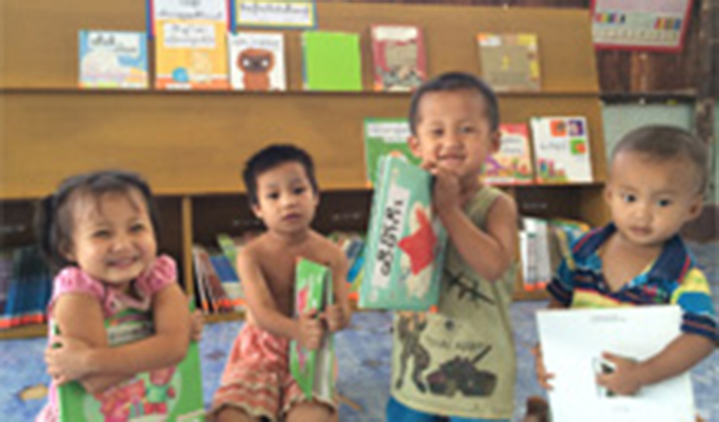 Photo: Children enjoying the picture books