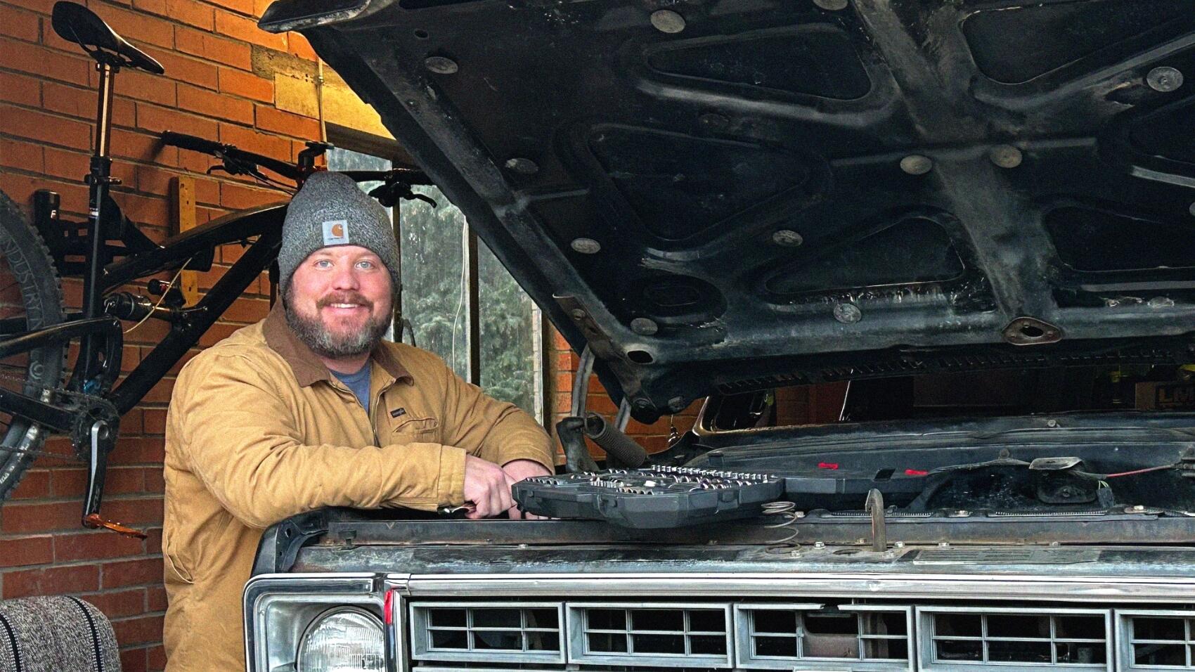 Gene restoring a 1979 Chevy pickup truck in his home garage