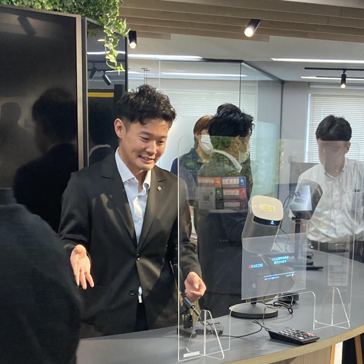 Sasaki using the Caption Display System Cotopat